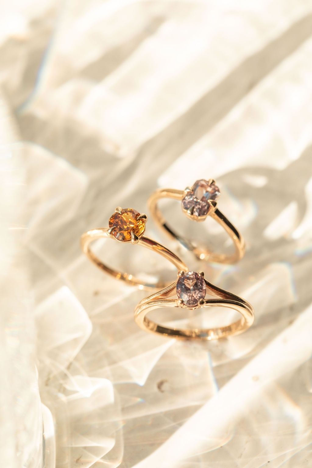 Gold rings with stones on silk